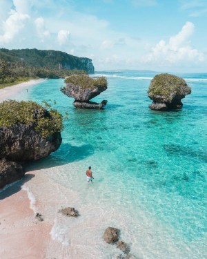 a group of people in a pool of water
