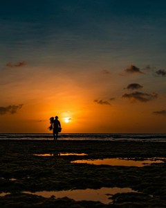 a sunset over a body of water