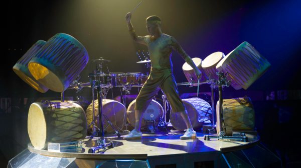 a laptop computer sitting on top of a table