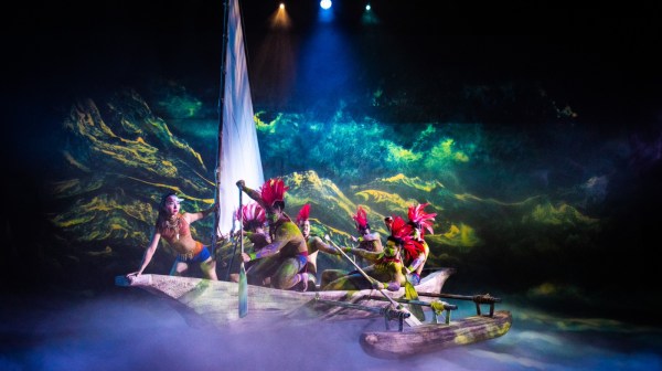 a person riding a skateboard at night