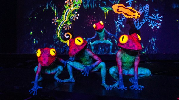 a traffic light is lit up at night