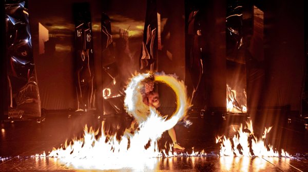 a close up of a light house at night