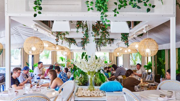 a group of people sitting at a table