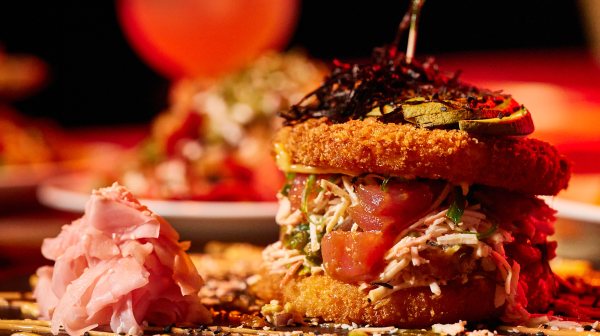a close up of a plate of food with a slice of cake
