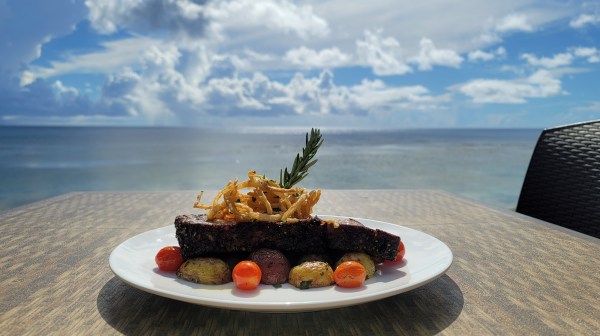 a plate of food sitting on a table