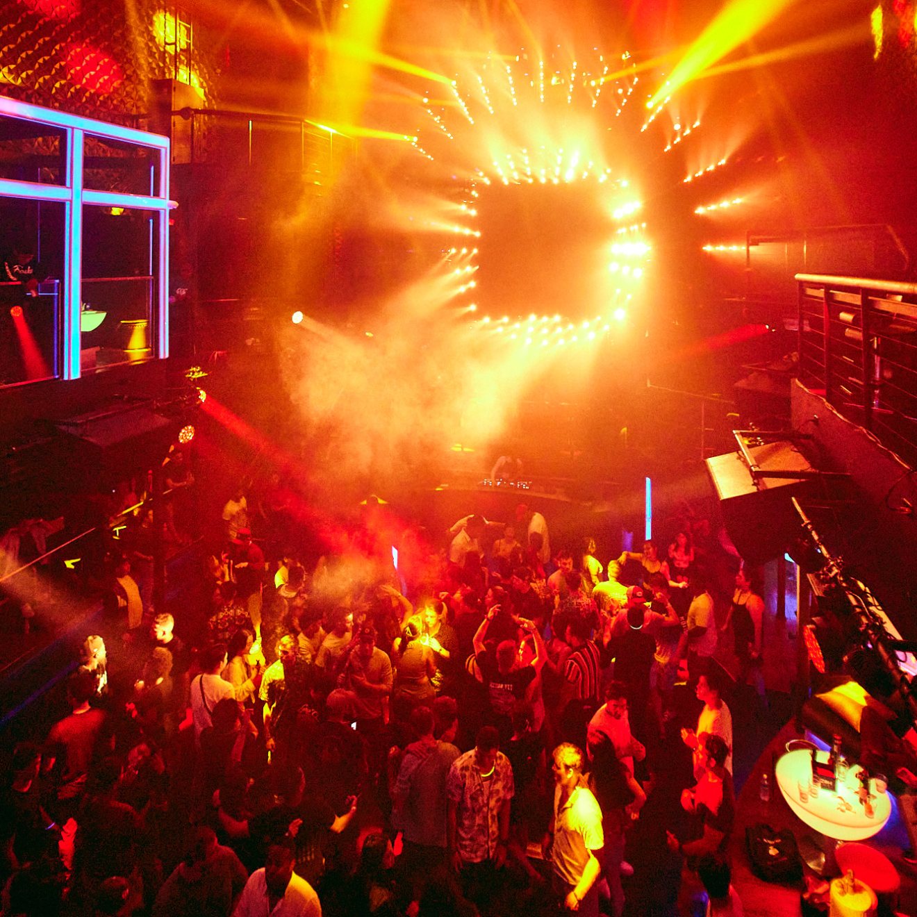 a group of people on a stage in front of a crowd