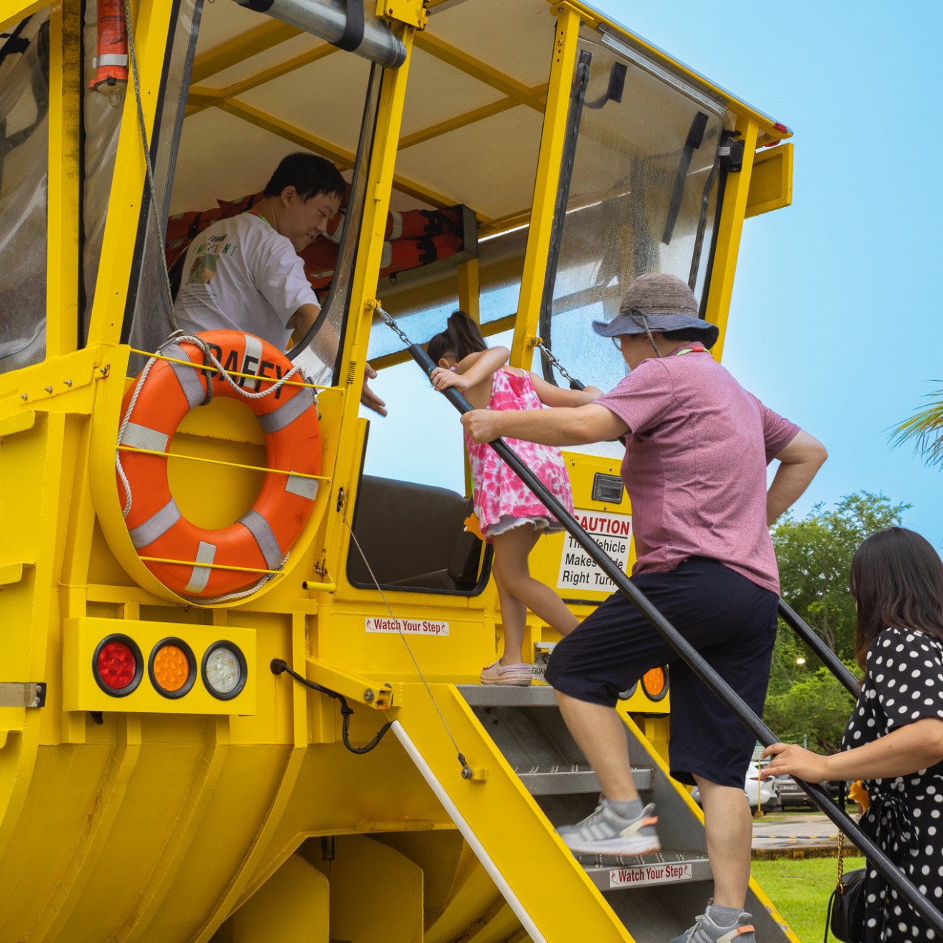 a man riding on the back of a truck