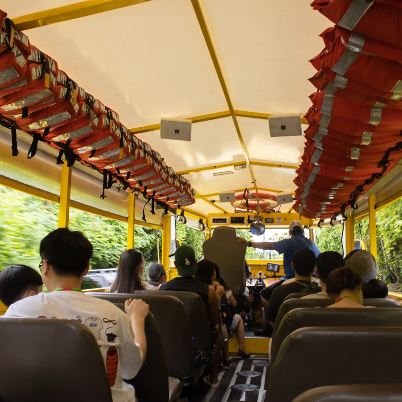 a group of people sitting at a train station