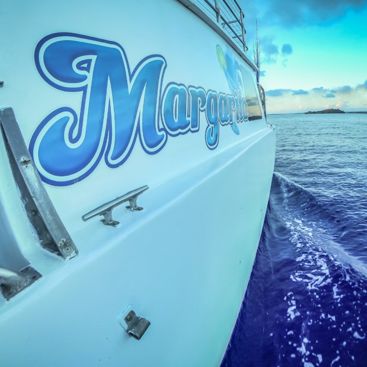 a boat sitting on top of a car