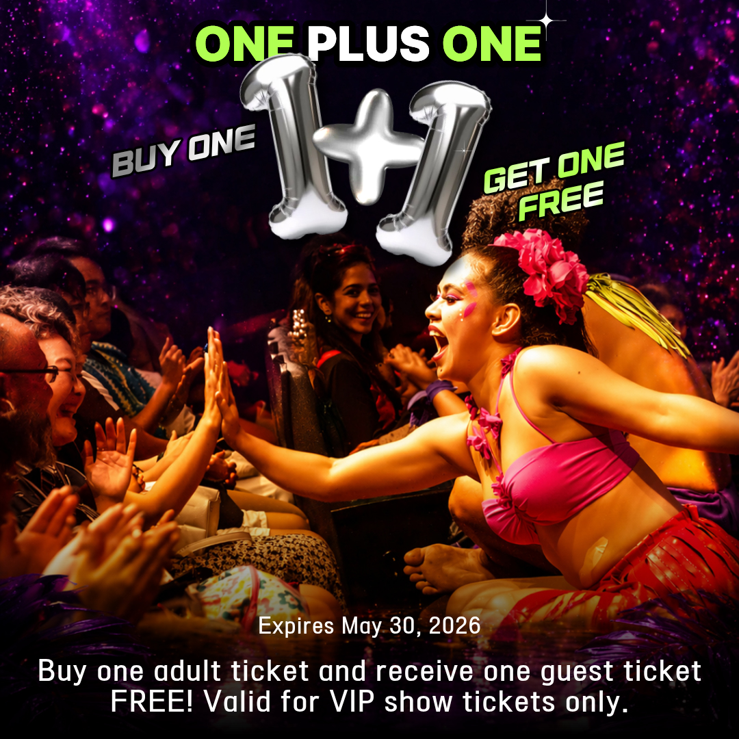 Excited performer in colorful outfit interacts with audience, promoting a buy one get one free ticket offer.