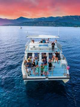 a small boat in a large body of water