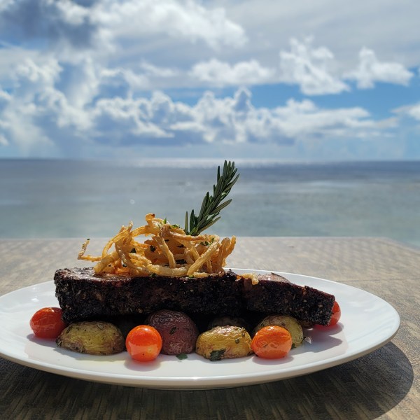 a plate of food sitting on a table
