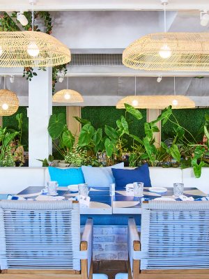 a table topped with a blue umbrella
