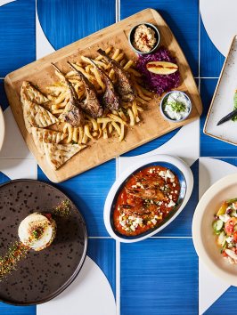 a box filled with different types of food on a plate