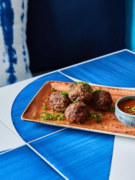 a piece of cake on a blue plate