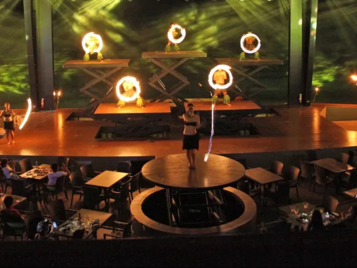 a group of people performing on a stage