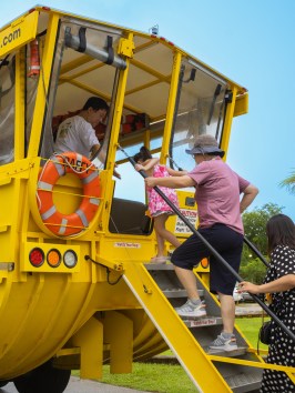 a man riding on the back of a truck