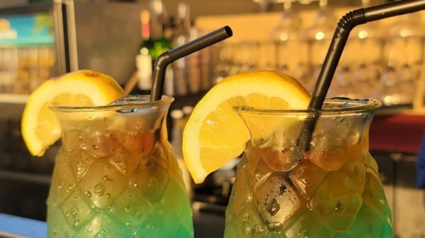 a green glass on a table