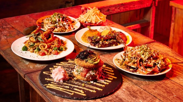 a plate of food on a wooden table