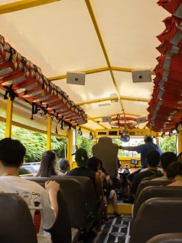 a group of people sitting at a train station