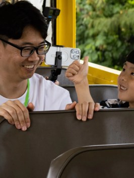 a man sitting on a bus