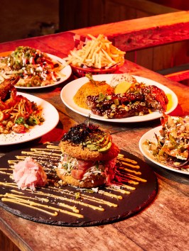 a plate of food on a wooden table