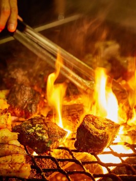 food cooking on a grill