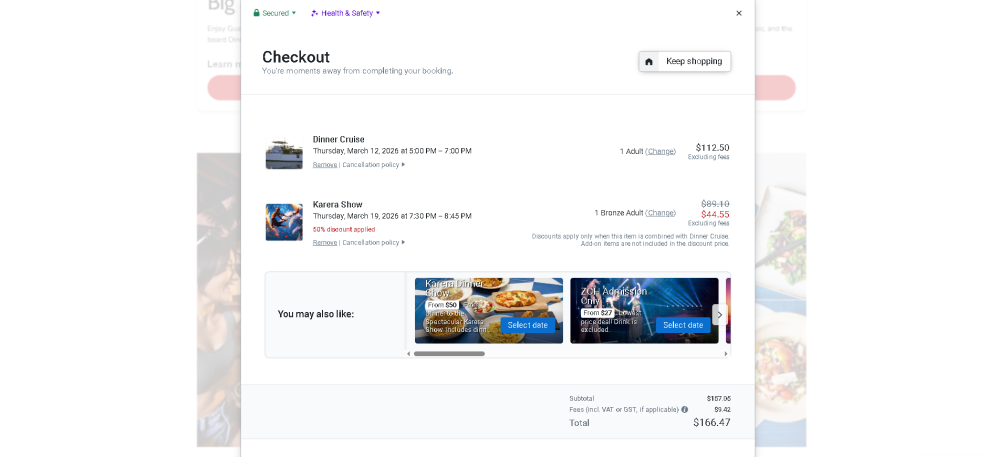 Checkout page showing a Dinner Cruise and Karera Show with prices, dates, and cart total.